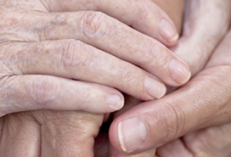image of holding a hand to convey comfort and help which links to our services guide - capital region and some national links to support to overcome barriers to getting health care